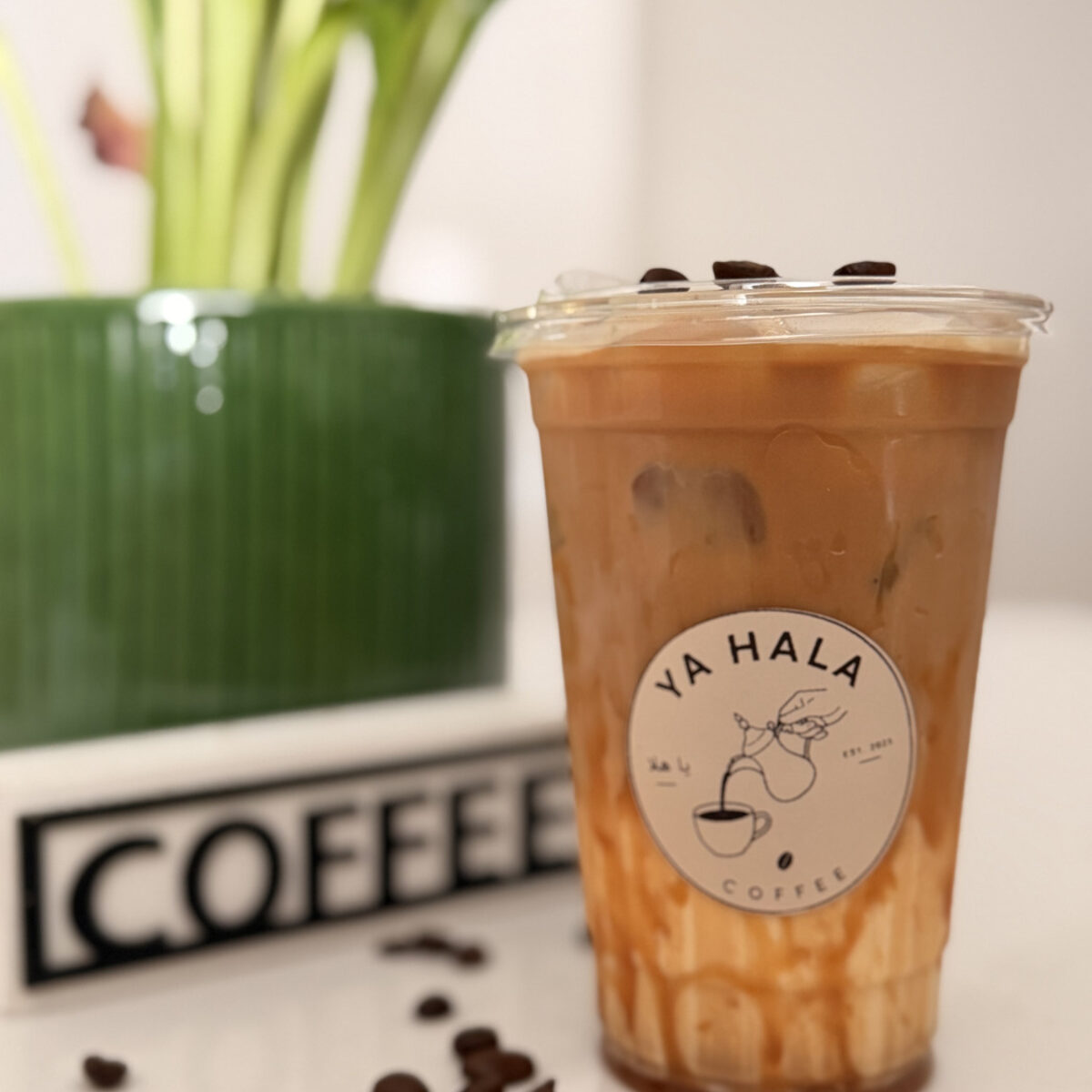 Handcrafted iced latte from the Ya Hala Coffee cart